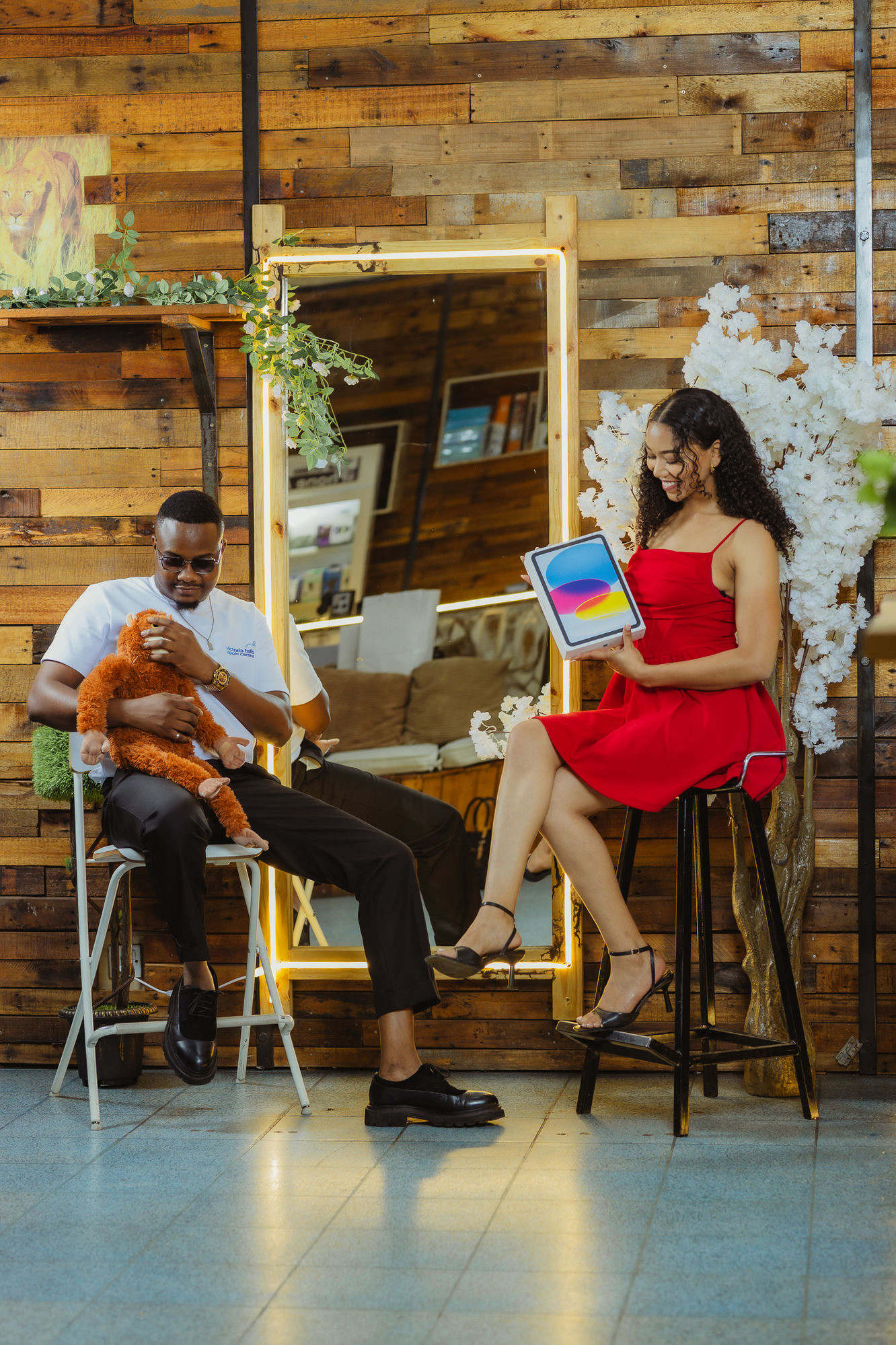 Two people admiring a new iPad