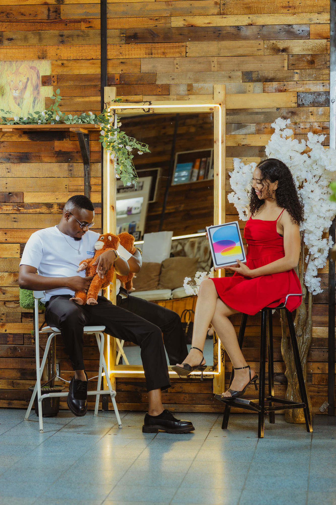Two people in the store with a new device